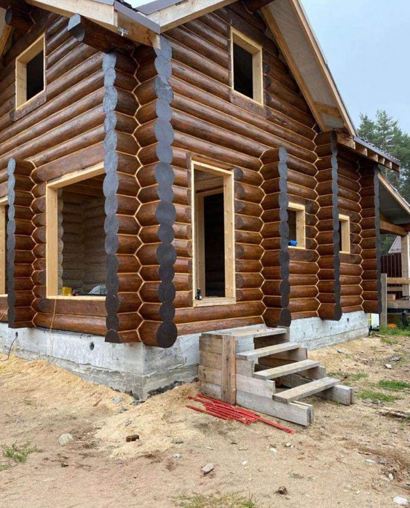 Покраска деревянного загородного дома